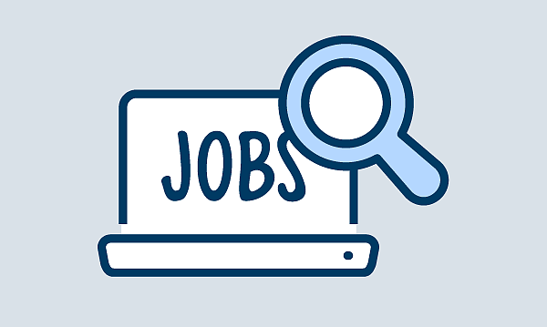 Laptop und Lupe als Icon